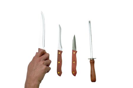 hand picking long kitchen knife with sharpening steel on white backgroundの写真素材