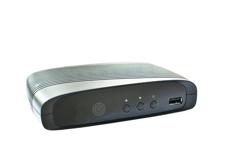 black digital television set top box receiver with plug in on white background