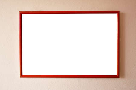 wooden picture frame hanging on old cement wall