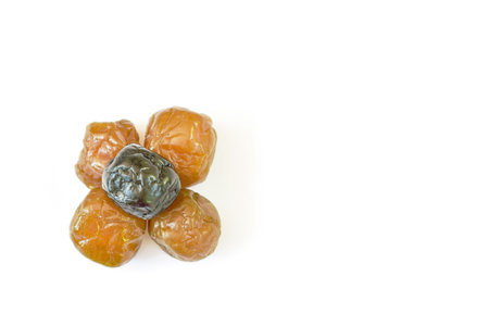 dry blueberry and prune fruit preserved food on white backgroundの写真素材