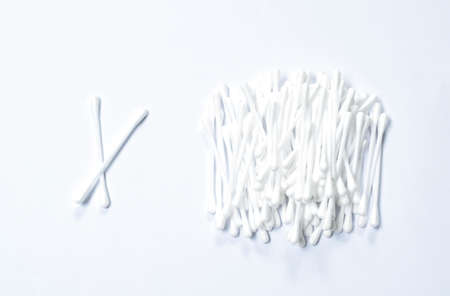 cotton bud with plastic stick arranging on white background