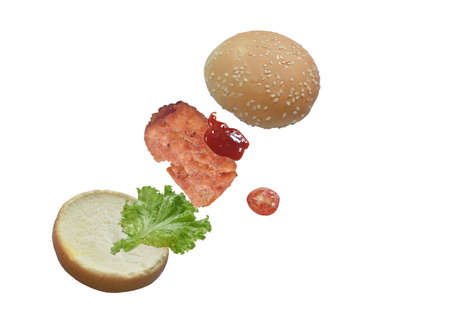 fried chicken hamburger stuffed lettuce and tomato with ketchup floating on white background