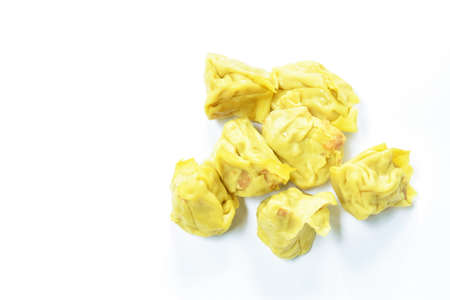frozen food raw Chinese dumpling stuffed mashed shrimp and pork or dim sum on white backgroundの写真素材