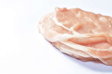 raw pork tenderloin slice ingredient food on white backgroundの写真素材