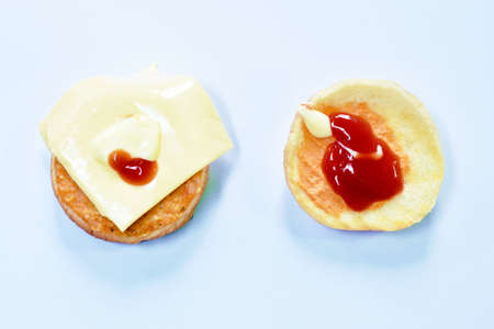 pork hamburger with cheese dressing ketchup and matonnaise on white background