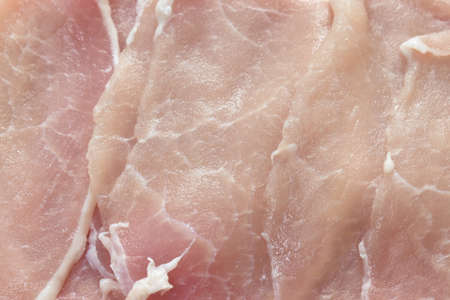 raw pork tenderloin slice  ingredient food on white backgroundの写真素材