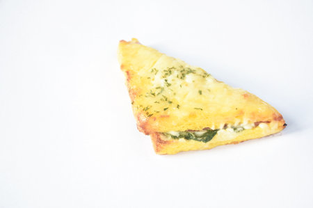 baking sandwich with cheese stuffed ham and mashed spinach on white background