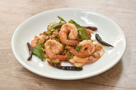 spicy and sour wing bean slice with chop pork topping boiled shrimp Thai salad on dishの写真素材