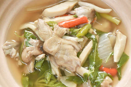 spicy boiled mixed mushroom and basil leaf soup on bowlの写真素材