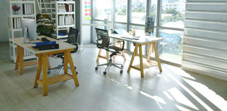 office room with business supply for meeting and television screen with morning sunlight