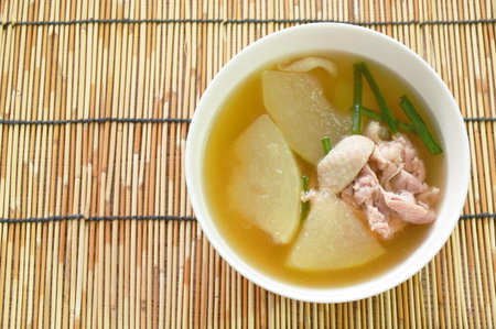 boiled winter melon with chicken meat soup on bowlの写真素材