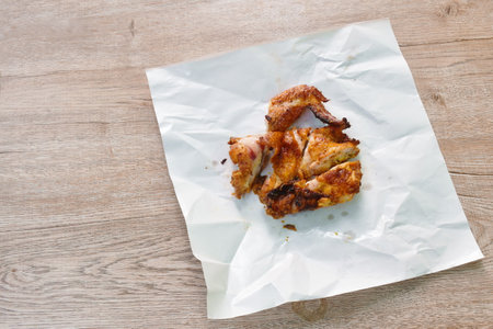 grilled chop chicken wing on with paper packaging take out foodの写真素材