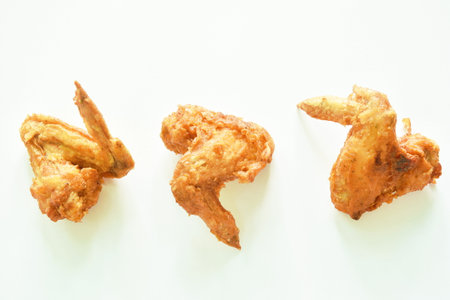 crispy fried chicken drum and wing arranging on white backgroundの写真素材