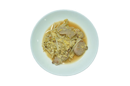 fried bean sprout with slice pork and egg vegetarian food on plateの写真素材