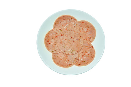 cold pork bologna stuffed chili slice arranging on plateの写真素材