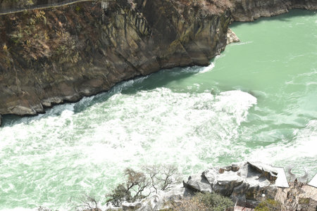 river flowing from mountain of tiger leaping Gorge travel location in China