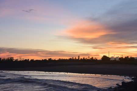 landscape of sea on sunset  at tilted pole beach in Thailandの写真素材
