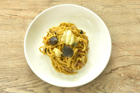 fried yakisoba Japanese noodles and cabbage with mushroom on plateの写真素材