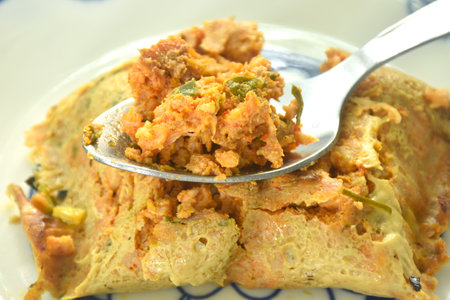 grilled chop pork curry in banana leave Thai northern food on plateの写真素材