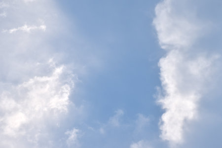 cloud spreading on bright sky in sunny dayの写真素材