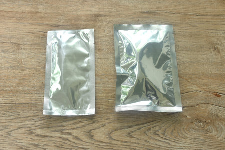 snack package aluminum foil mock-up arranging on tableの写真素材