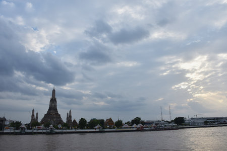 landscape of pagoda at temple of dawn travel location in Thailand on sunset skyの写真素材