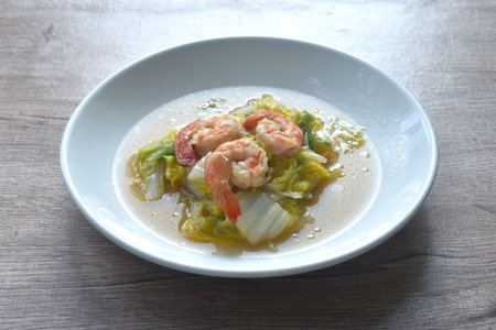 fried slice cabbage with shrimp in soy sauce on plateの写真素材