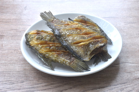 deep fried snake skin catfish or gourami arranging on dishの写真素材
