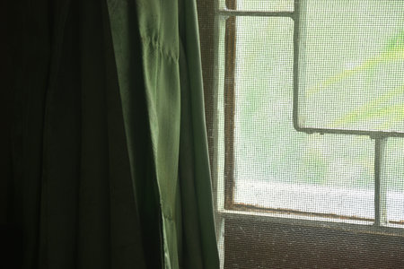 light spreading through window and curtain on home texture and backgroundの写真素材