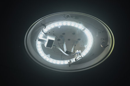 circle white LED lamp flashing on home rooftop
