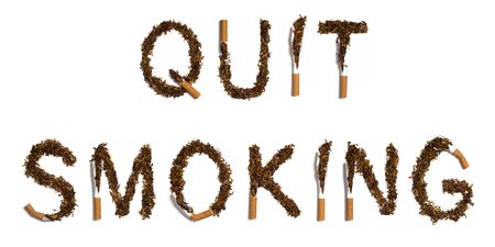  quit  written with destroyed cigarettesの写真素材