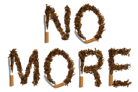 NO MORE  written with destroyed cigarettesの写真素材