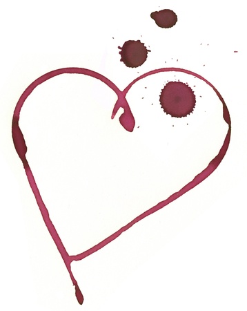 heart shape made with stain from wine glassの写真素材