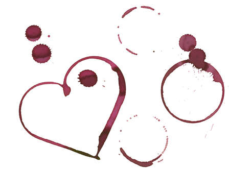 heart shape and circles made with stain from wine glassの写真素材