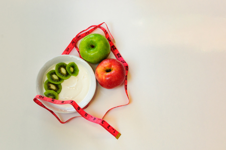 diet concept, apples and yogurt bowl and cereals, healthy dietの写真素材