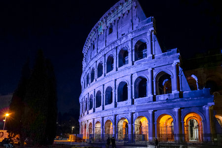Rome coliseum facade with blue light projection to commemorate international epilepsy day