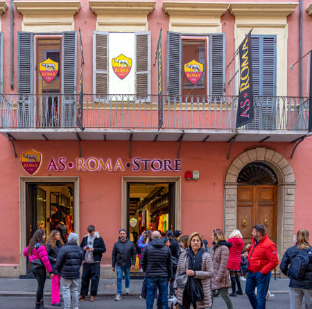 Roma football club shop door with ground floor and first floor with pink painted wall in Rome city center.のeditorial素材