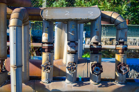 pipes and valves of an old water treatment plant, Thailand.