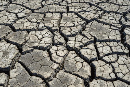 Dry cracked earth background. Global warming and climate change concept.の写真素材