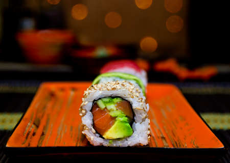 Japanese seafood sushi, rolls with tuna, salmon, avocado.の写真素材