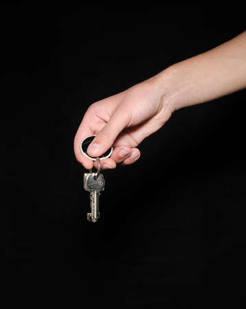 Hand holding keysの写真素材