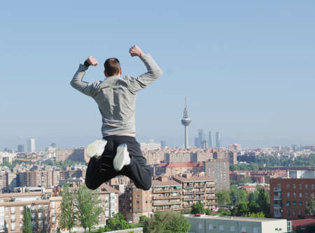 A man in a park, enjoying looking at the city. Madrid, Spainの写真素材