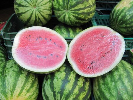 Striped watermelon in the groceryの写真素材