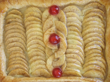 Apple pie decorated with cherries  の写真素材