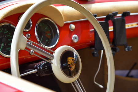 MONZA, ITALY - MAY 19 : classic car interior with close-up on steering wheel. Car in old racing car...