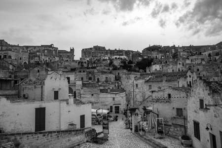 Matera, Italy - August 31 2020: A typical house and streets stone in the in the ancient city of Matera Italy. Photo in black and white.のeditorial素材