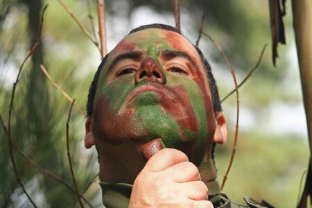 Military training combat, face camouflageの写真素材