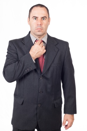 Business man adjusting tie, Business man style の写真素材