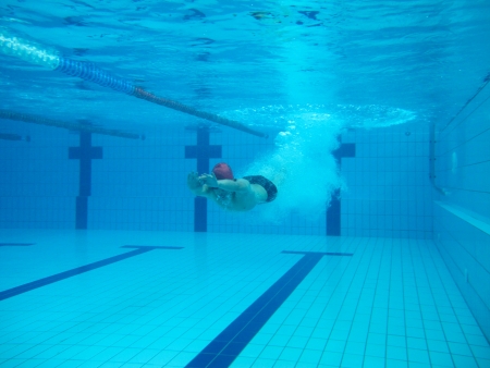 swimmer in comptition, swimming underwater photo の写真素材