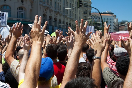 MADRID - JUN 19: Thousands gather to protest for economic equality in Neptuno Square during the...